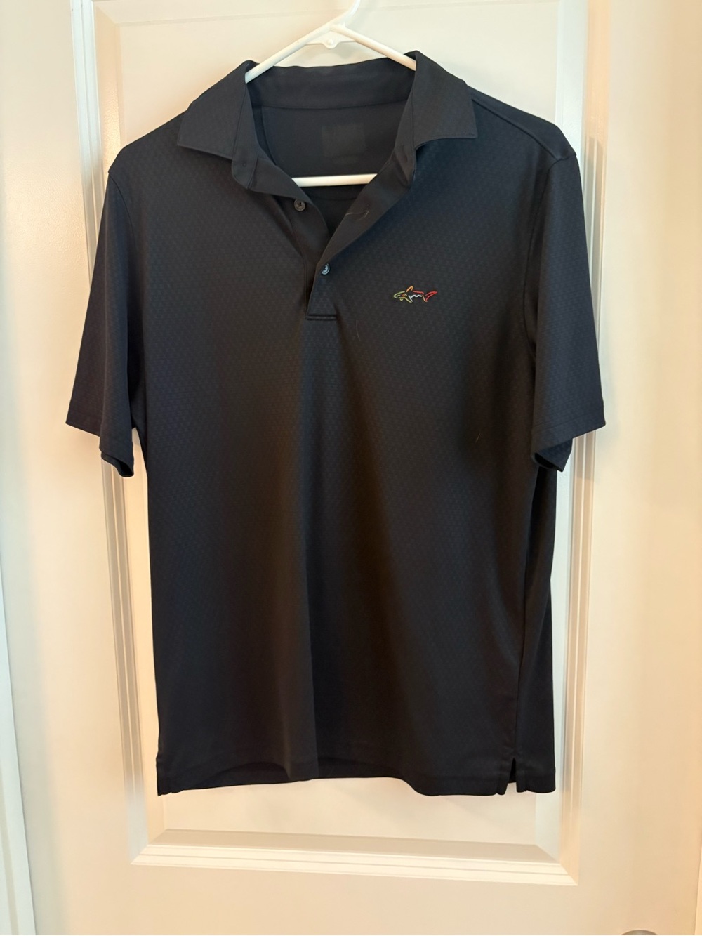 Greg Norman Collection Black Short Sleeve Polo with Subtle Emblem